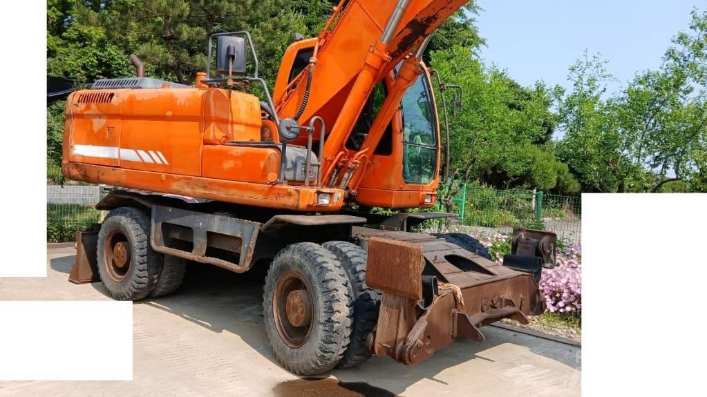 Doosan DX 210 W Kolová rýpadla