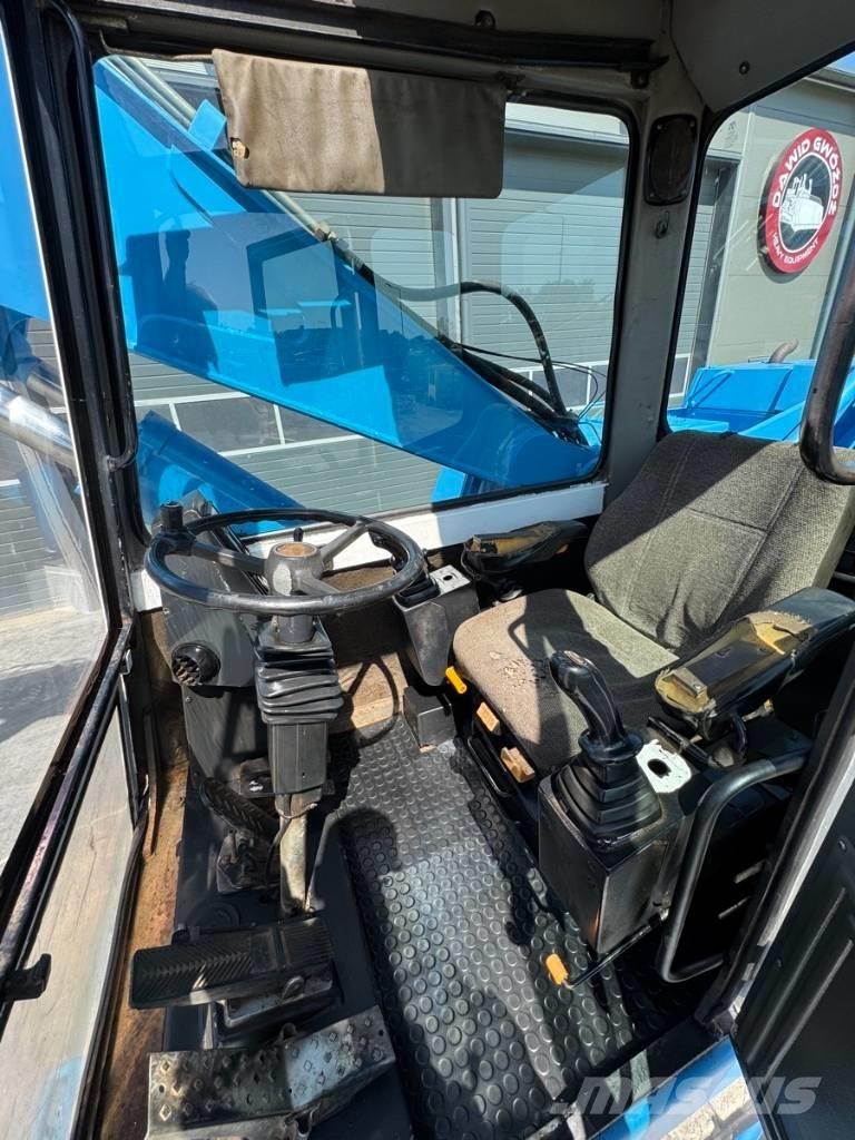 Fuchs MHL 331 Stroje pro manipulaci s odpadem