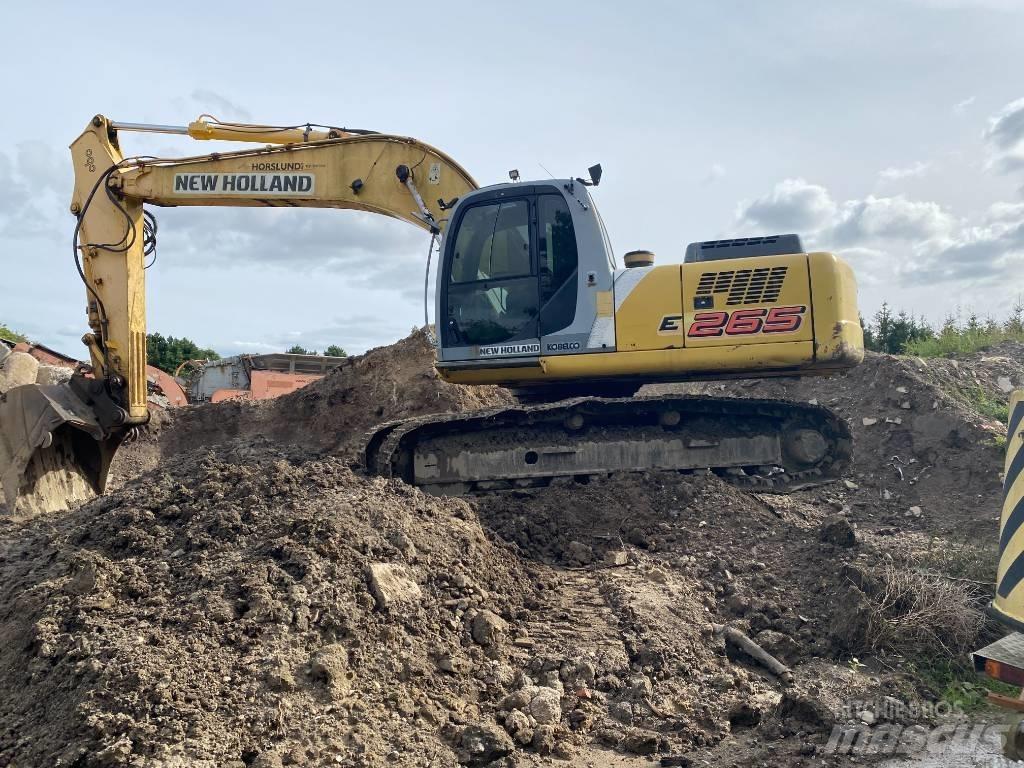 New Holland E 265 Pásová rýpadla