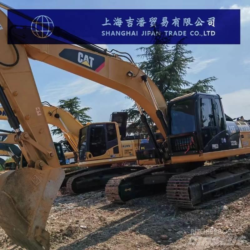 CAT 323 D Pásová rýpadla