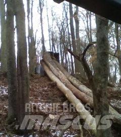 CAT 515 Skidder Smykem řízené nakladače