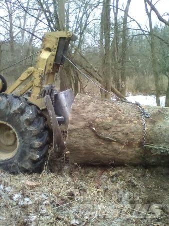 CAT 515 Skidder Smykem řízené nakladače