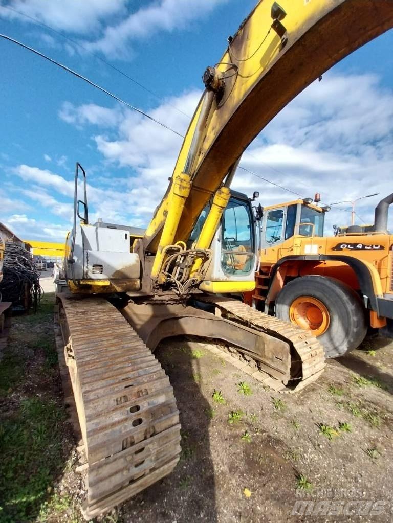 New Holland E 305 Pásová rýpadla
