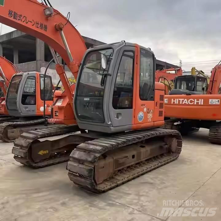 Hitachi ZX135US Pásová rýpadla