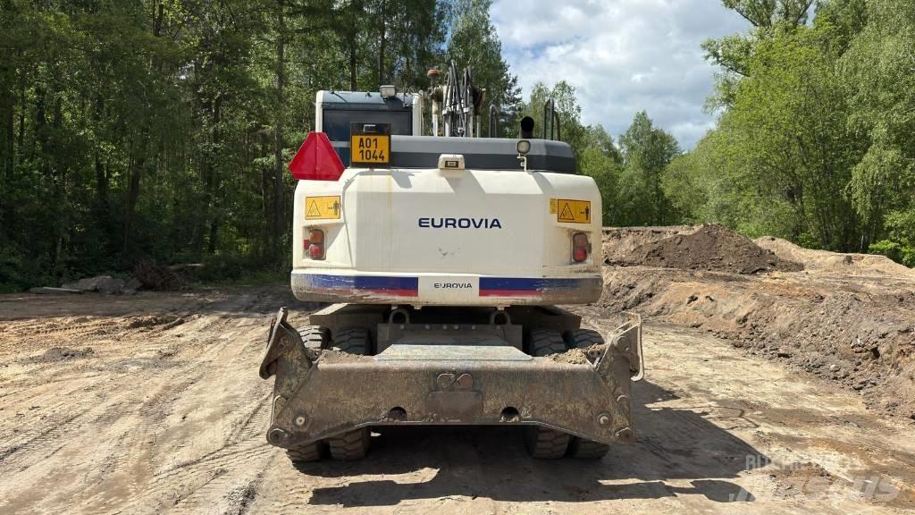 Komatsu PW 148-8 Kolová rýpadla