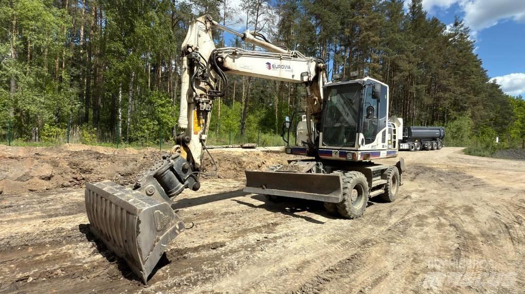 Komatsu PW 148-8 Kolová rýpadla