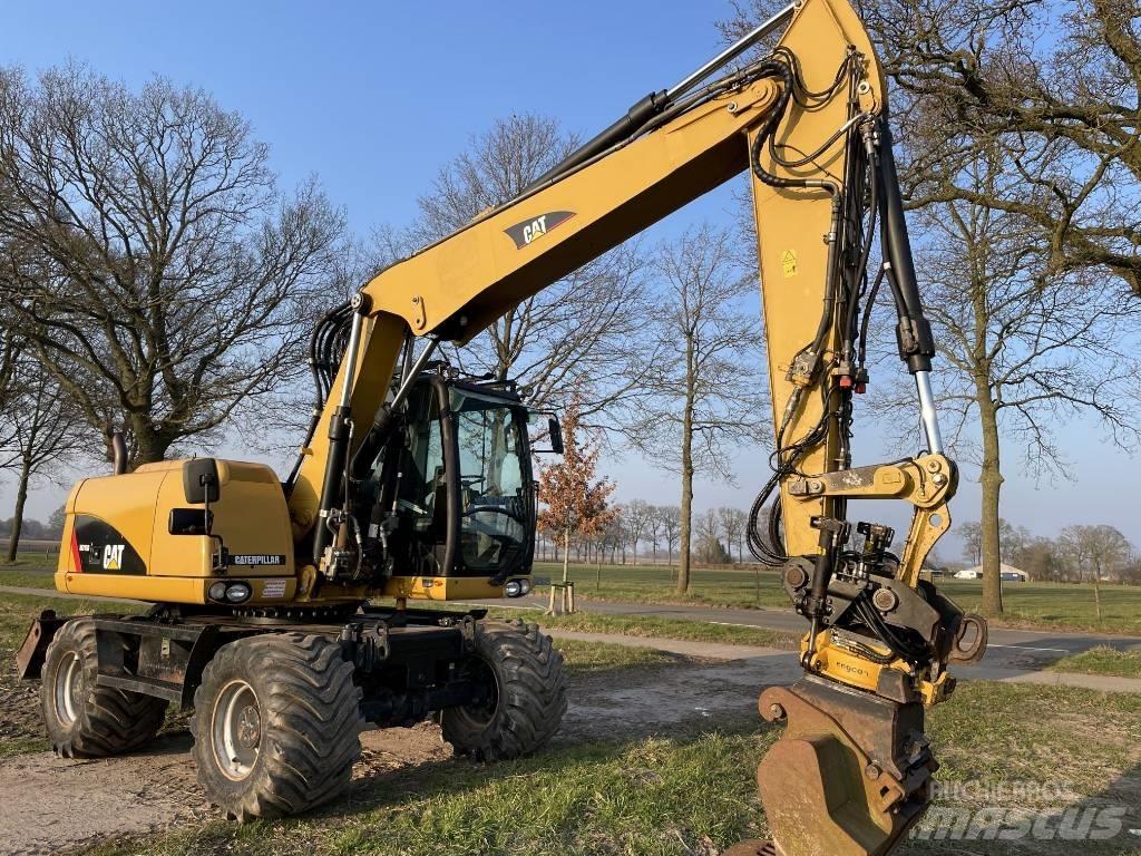 CAT M 313 D Kolová rýpadla
