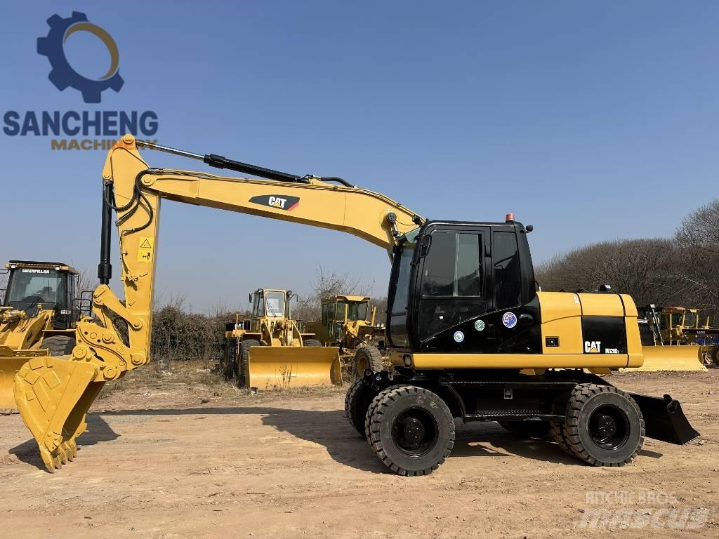 CAT M 320 D2 Kolová rýpadla