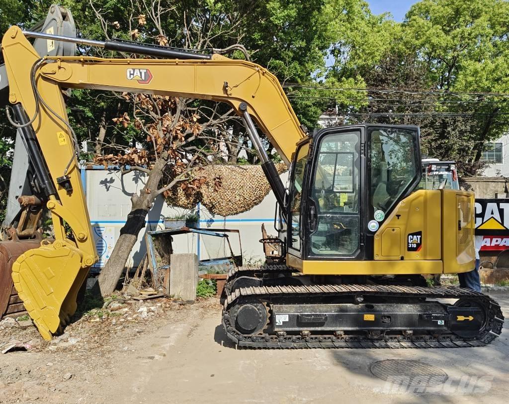 CAT 310 Pásová rýpadla