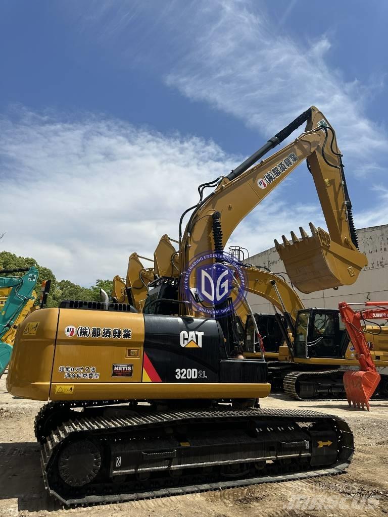 CAT CAT323 Pásová rýpadla