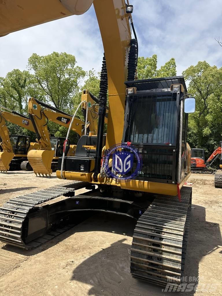CAT CAT323 Pásová rýpadla