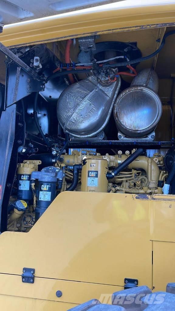 CAT 938M Kolové nakladače