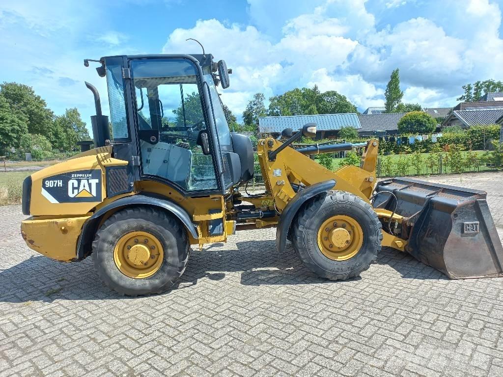 CAT 907 H Kolové nakladače