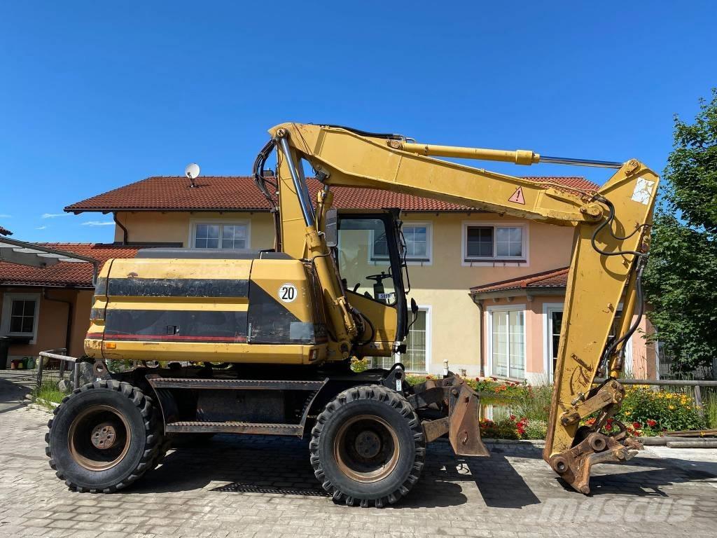CAT M 312 Kolová rýpadla