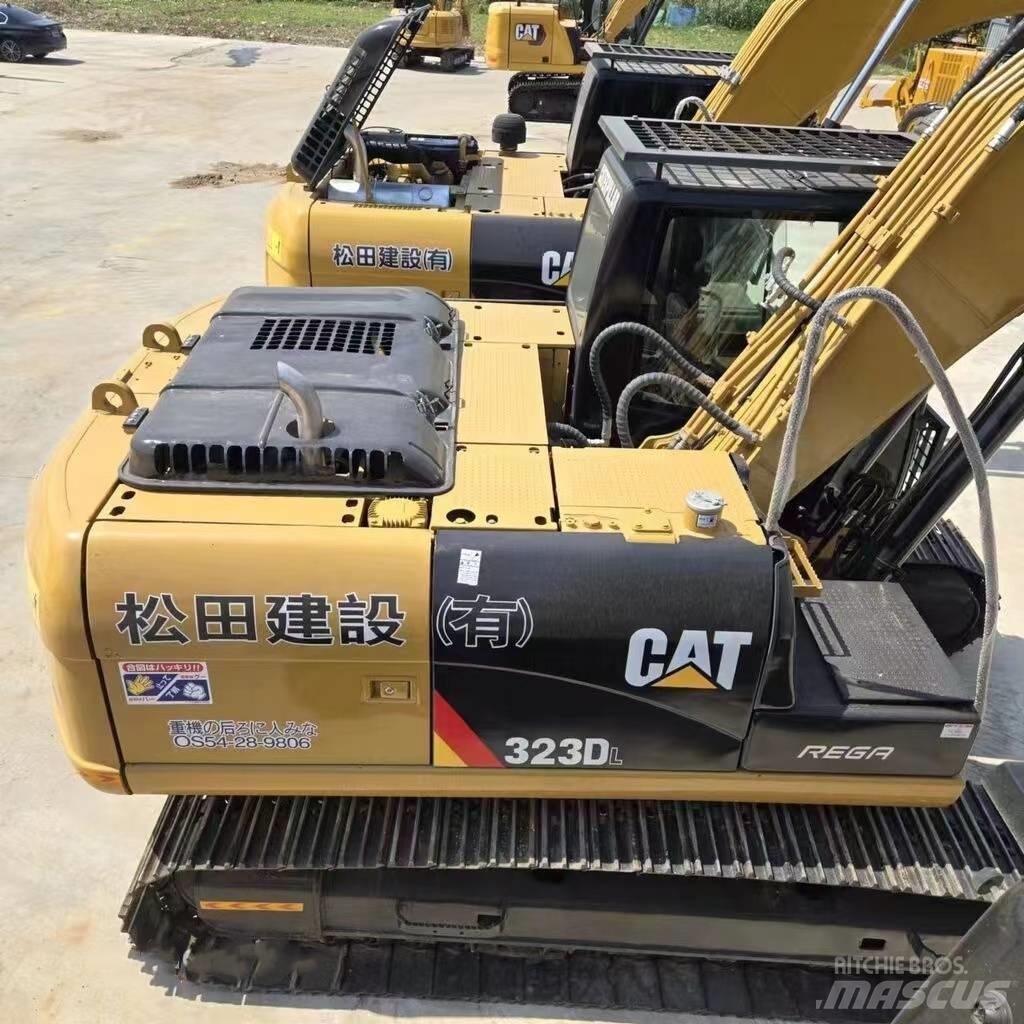 CAT 323 D Pásová rýpadla