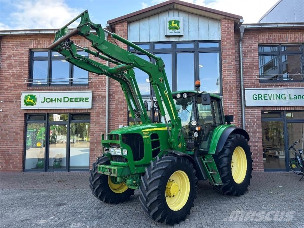 John Deere 6530 Traktory
