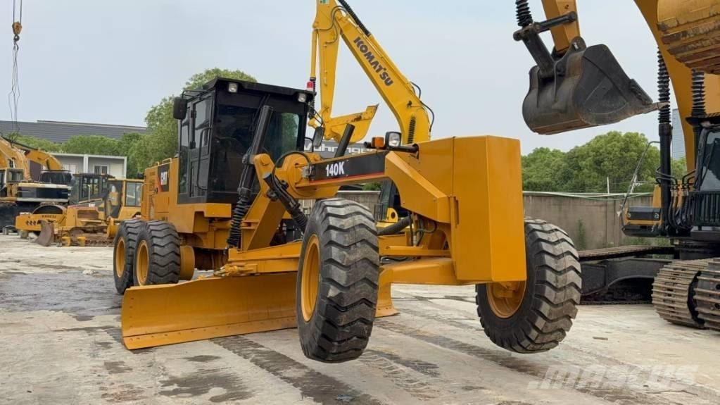 CAT 140K Grejdry