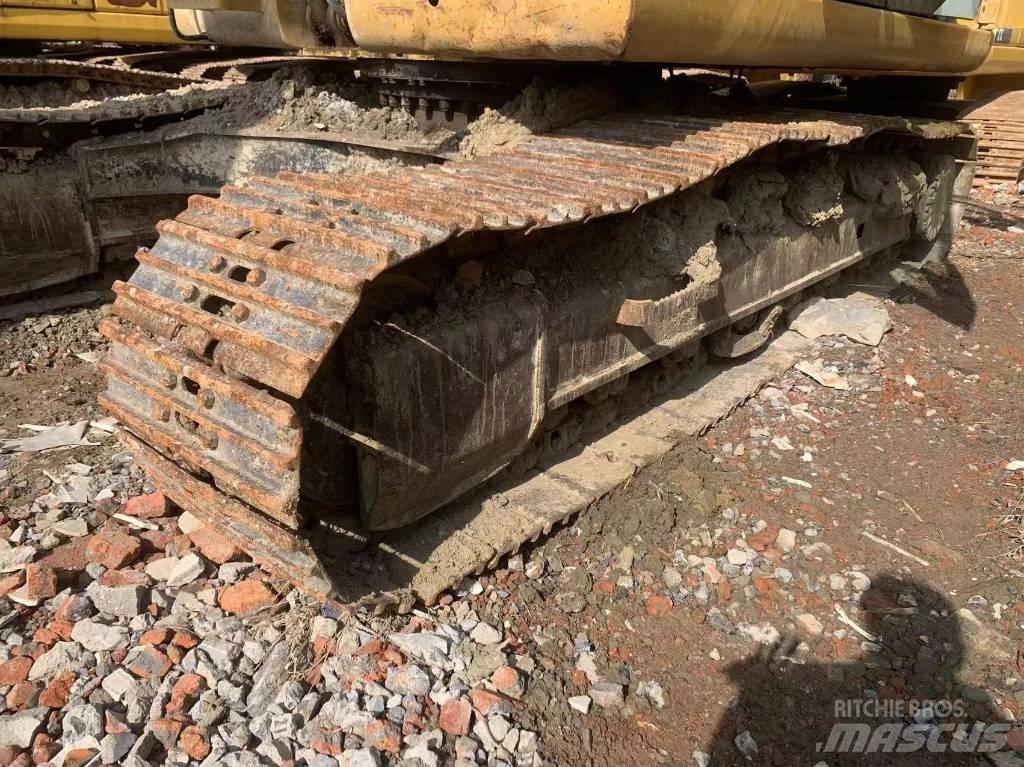 CAT 323D2 Pásová rýpadla