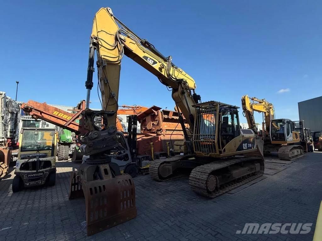 CAT 319D Pásová rýpadla