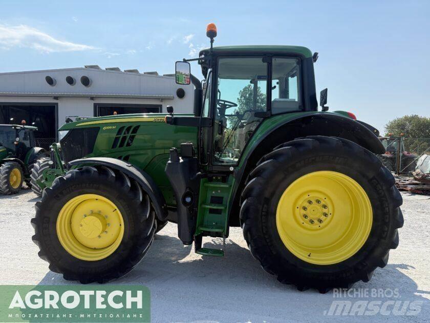 John Deere 6195M Traktory