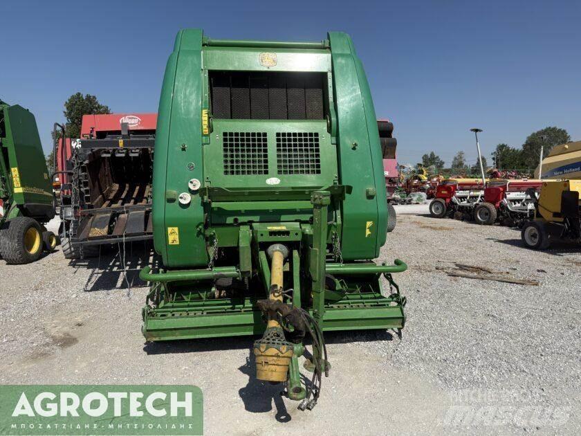 John Deere 864 Lis na válcové balíky