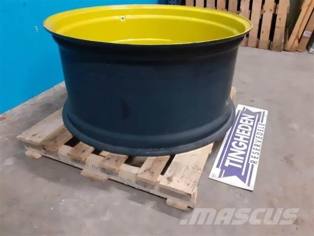  38 W18AX38 Pneumatiky, kola a ráfky