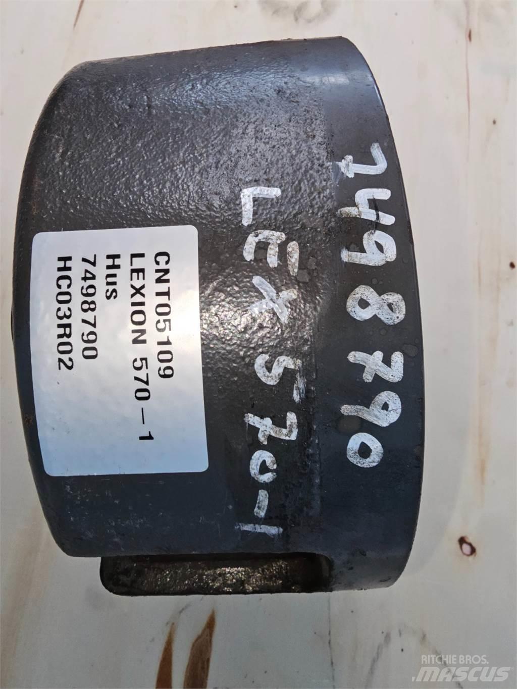 CLAAS Lexion 570 Sypače písku a soli