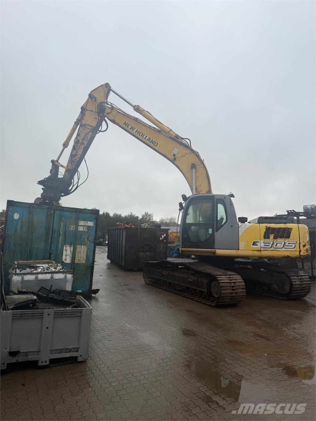 New Holland E305 Pásová rýpadla