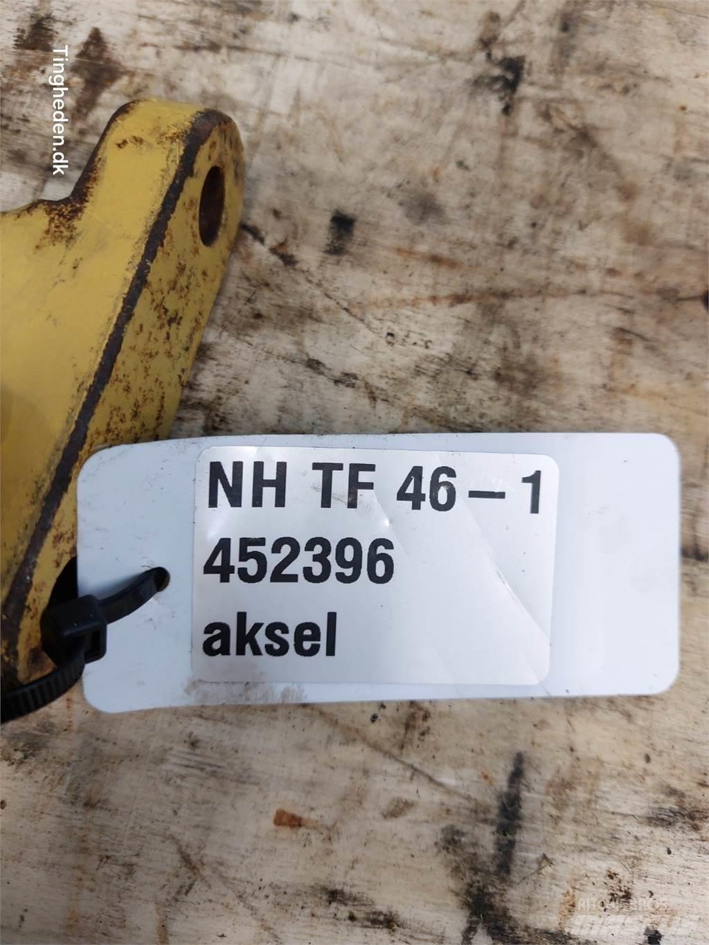 New Holland TF46 Sypače písku a soli