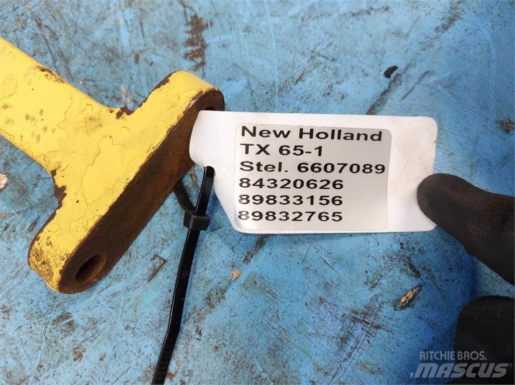 New Holland TX65 Sypače písku a soli