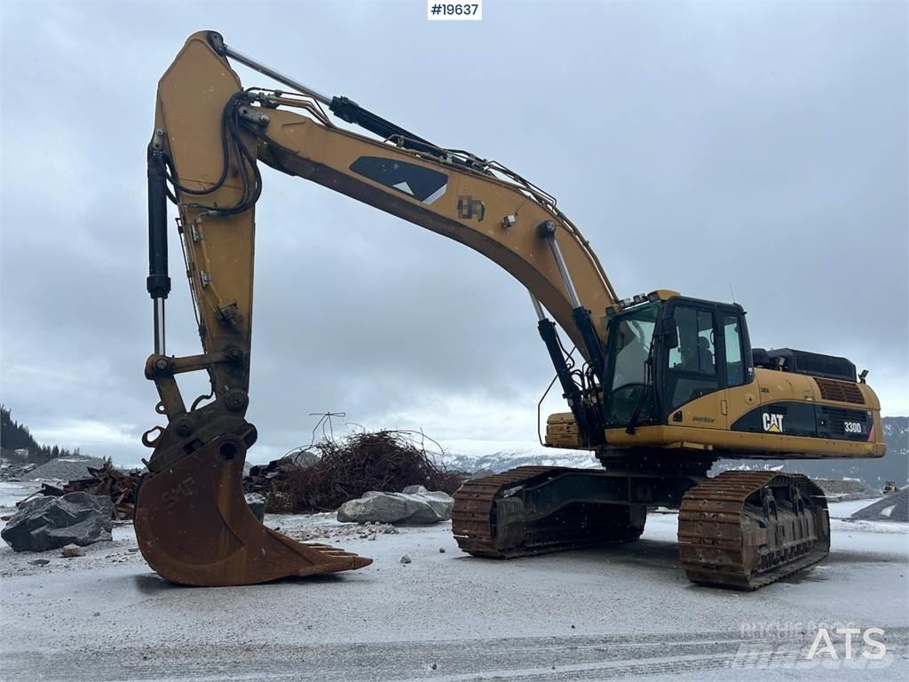 CAT 300D Pásová rýpadla