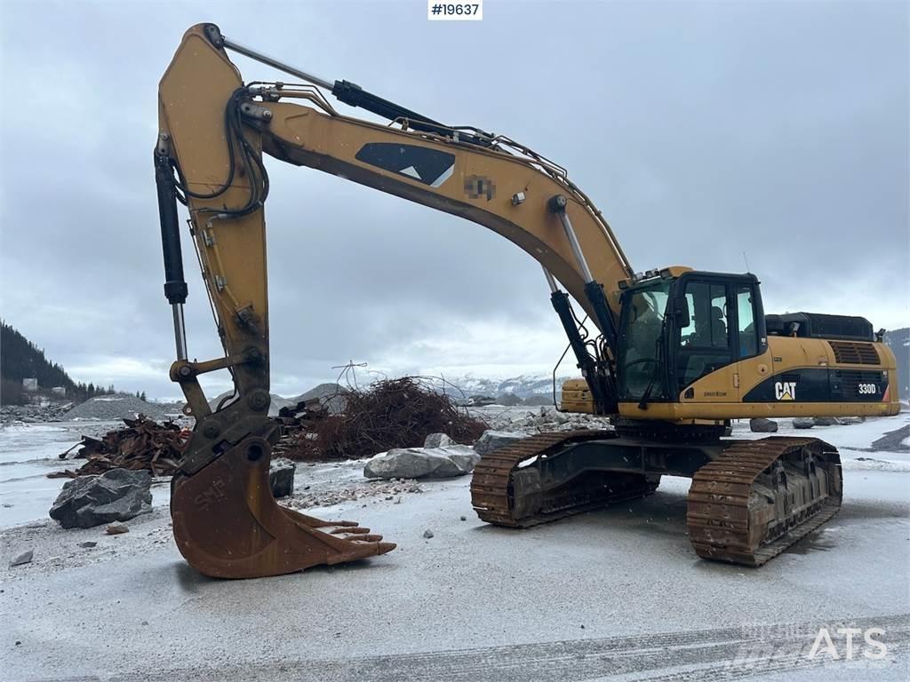 CAT 300D Pásová rýpadla