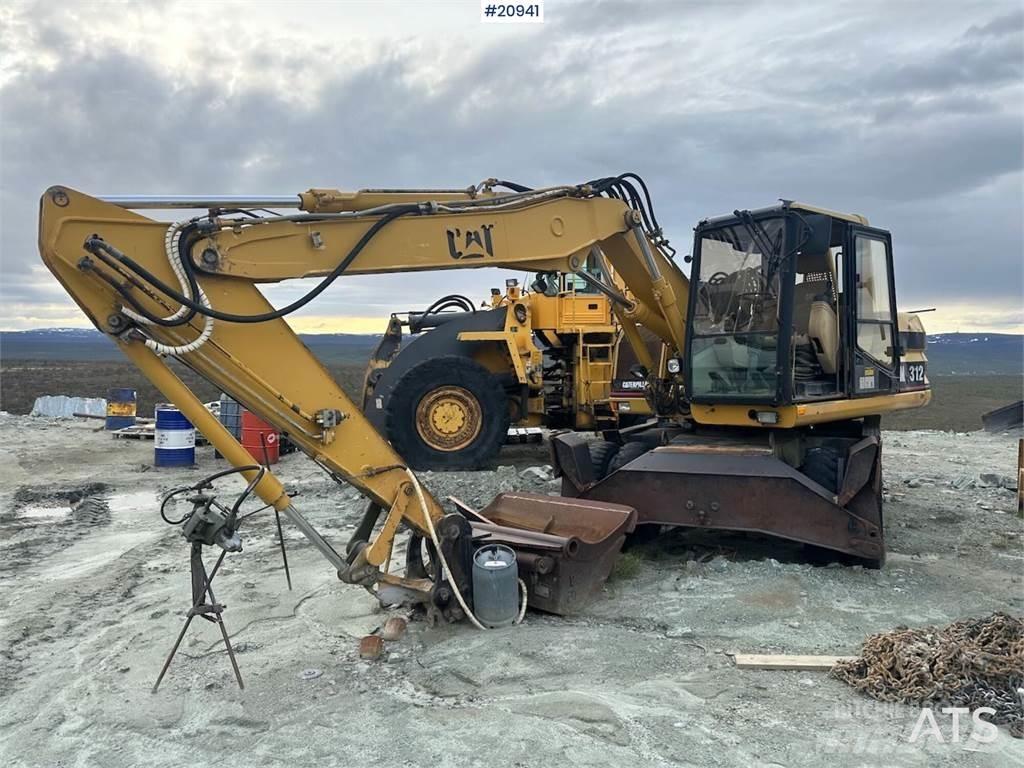 CAT 312 Kolová rýpadla