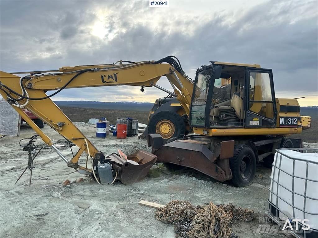 CAT 312 Kolová rýpadla