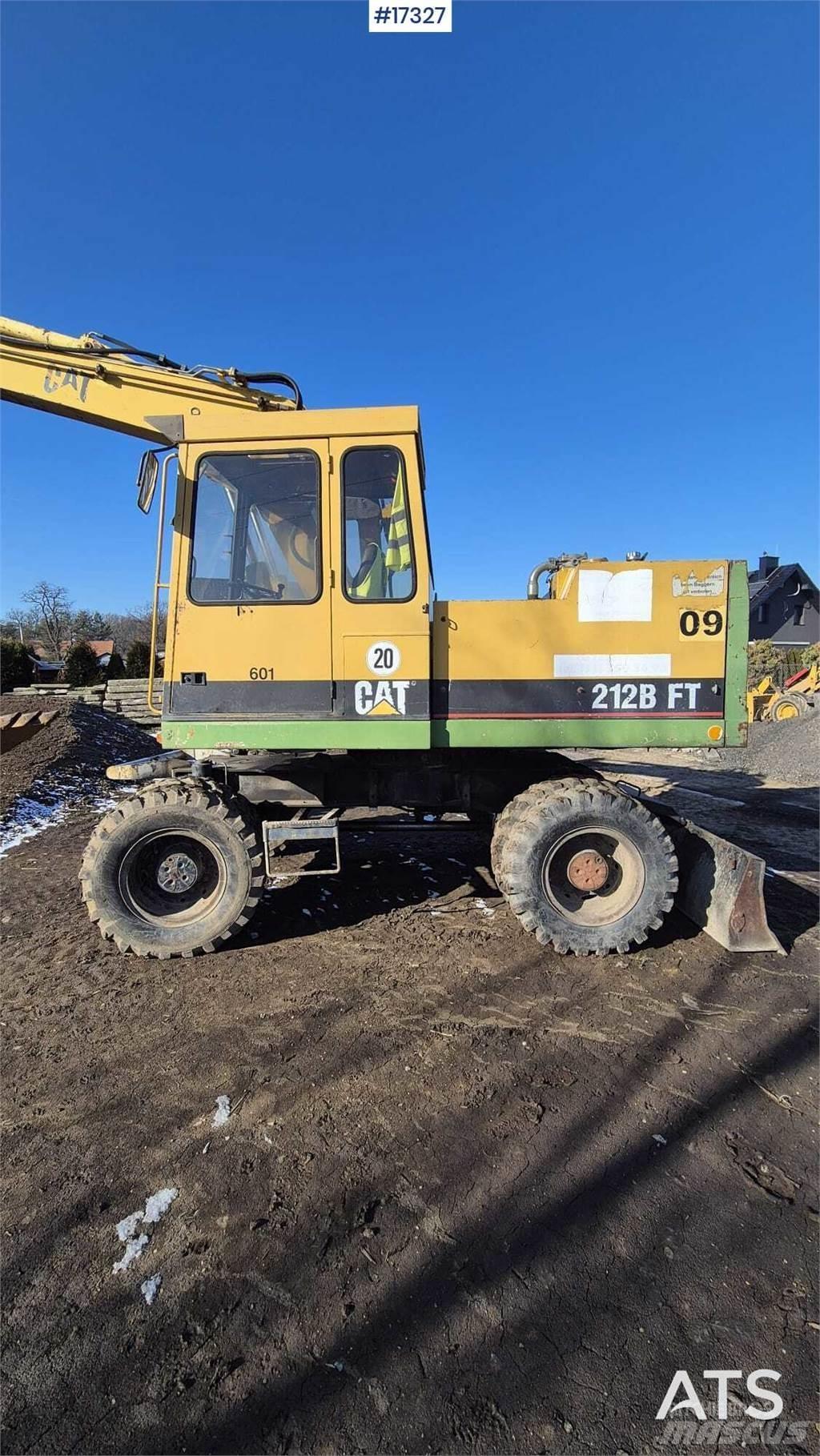 CAT 212BFT Kolová rýpadla