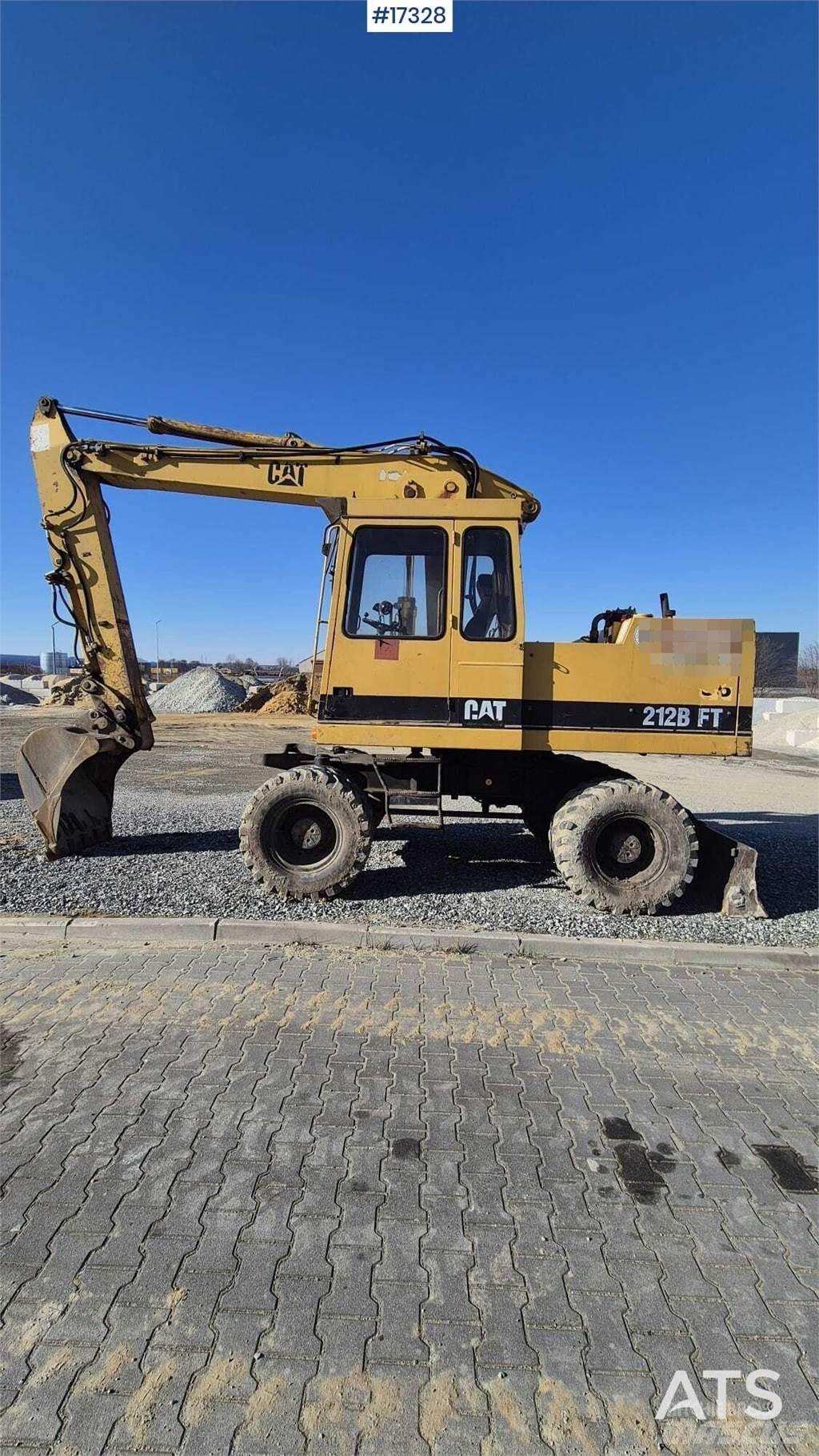CAT 212BFT Kolová rýpadla