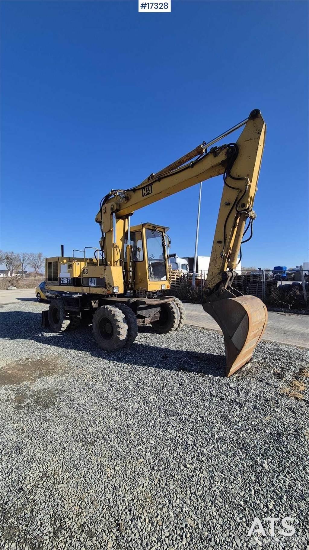 CAT 212BFT Kolová rýpadla