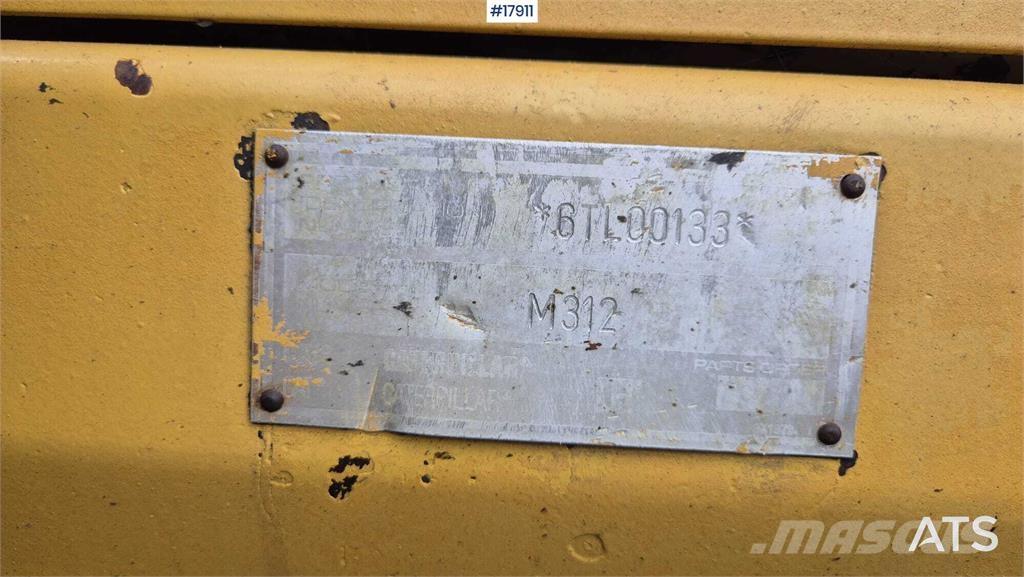 CAT M312 Kolová rýpadla