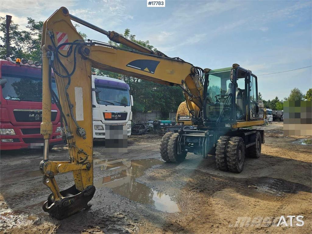 CAT M315C Kolová rýpadla