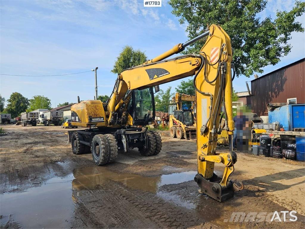 CAT M315C Kolová rýpadla