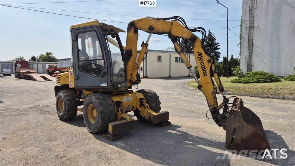 Mecalac 12MX Kolová rýpadla