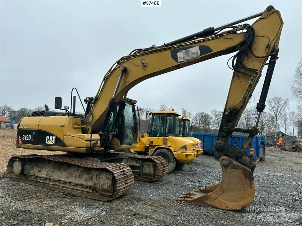 CAT 319D Pásová rýpadla