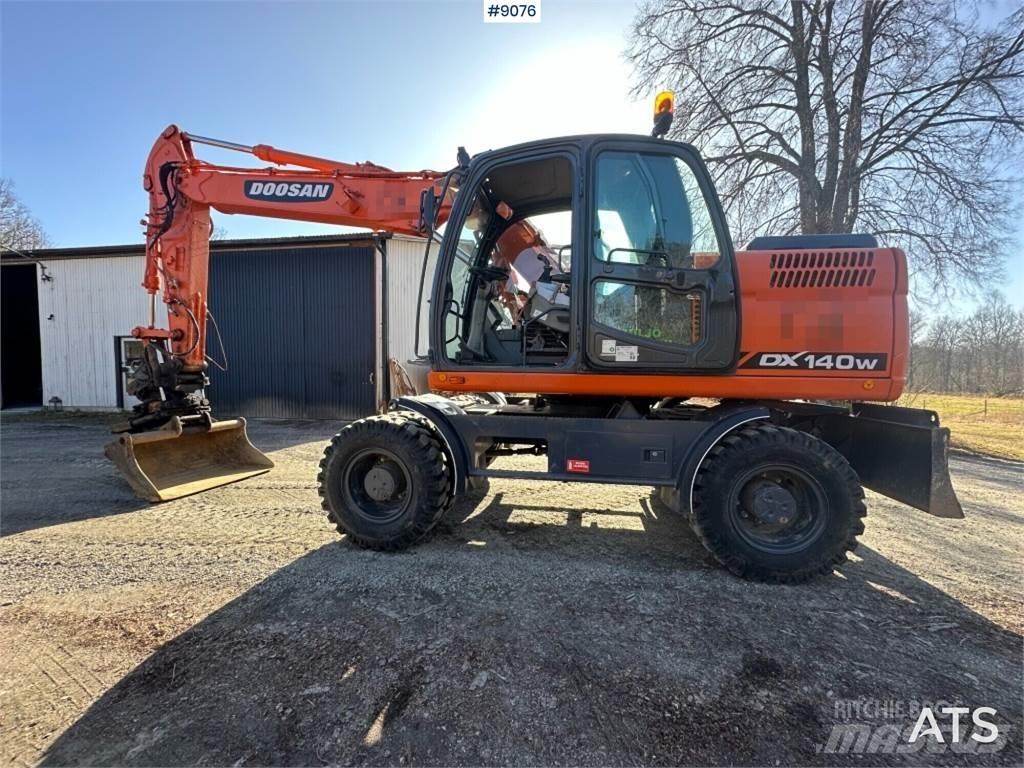Doosan DX140W Kolová rýpadla
