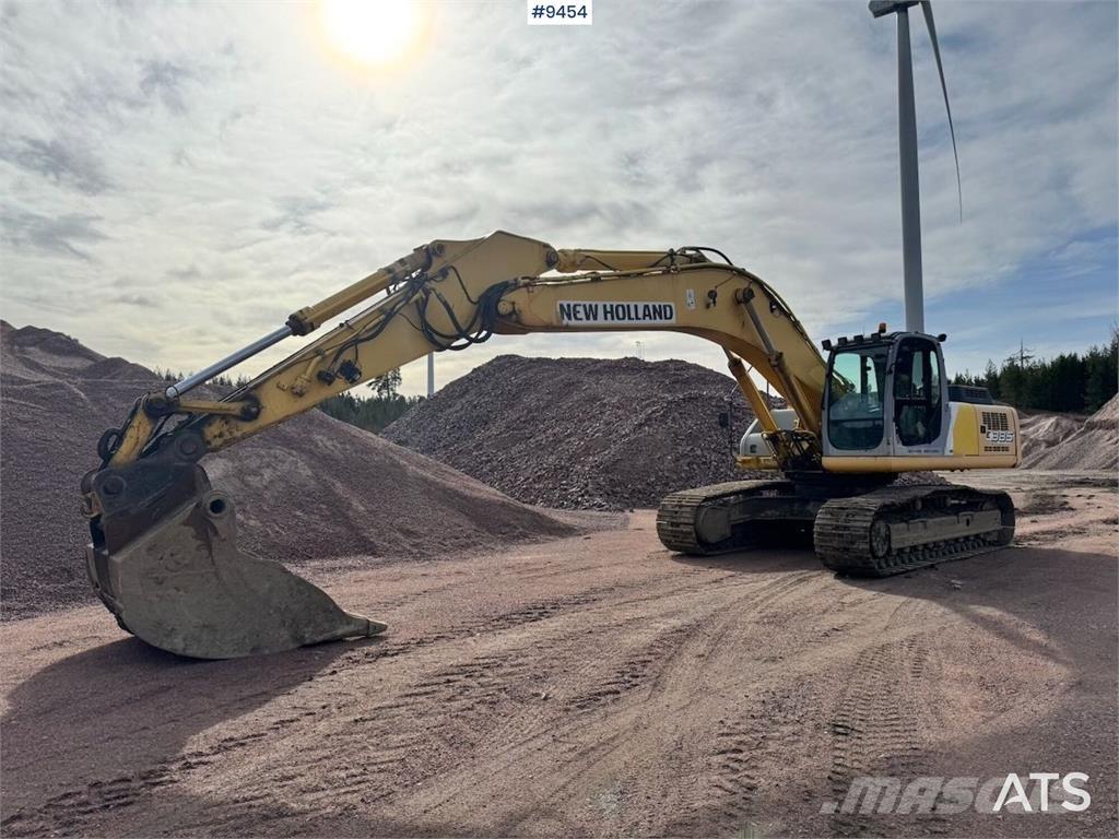 New Holland E385 Pásová rýpadla