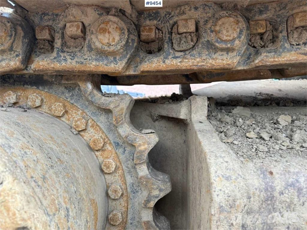 New Holland E385 Pásová rýpadla