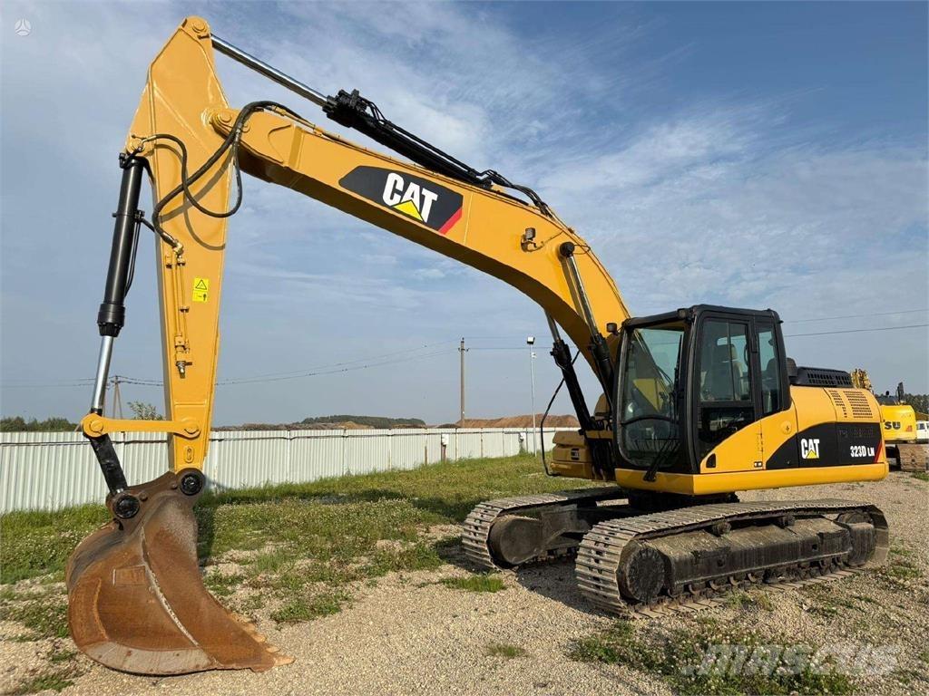 CAT 323 D Pásová rýpadla