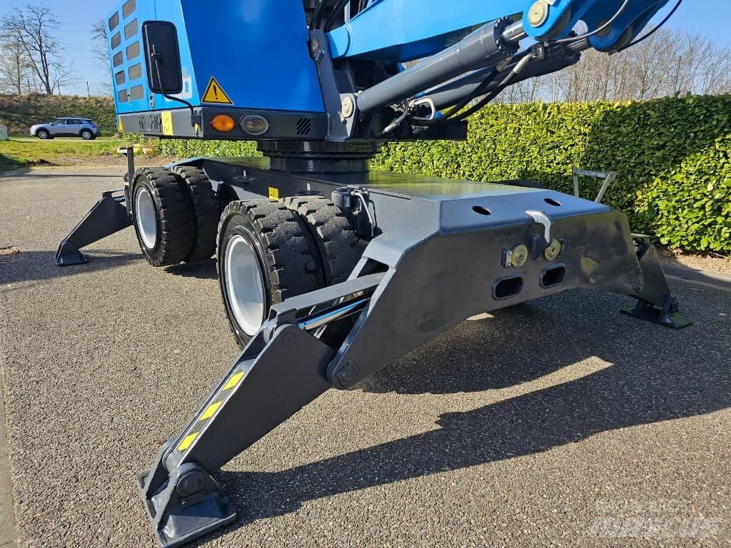 Fuchs MHL 320 Stroje pro manipulaci s odpadem