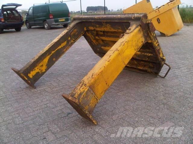 CAT 990 II Podvozky a zavěšení kol