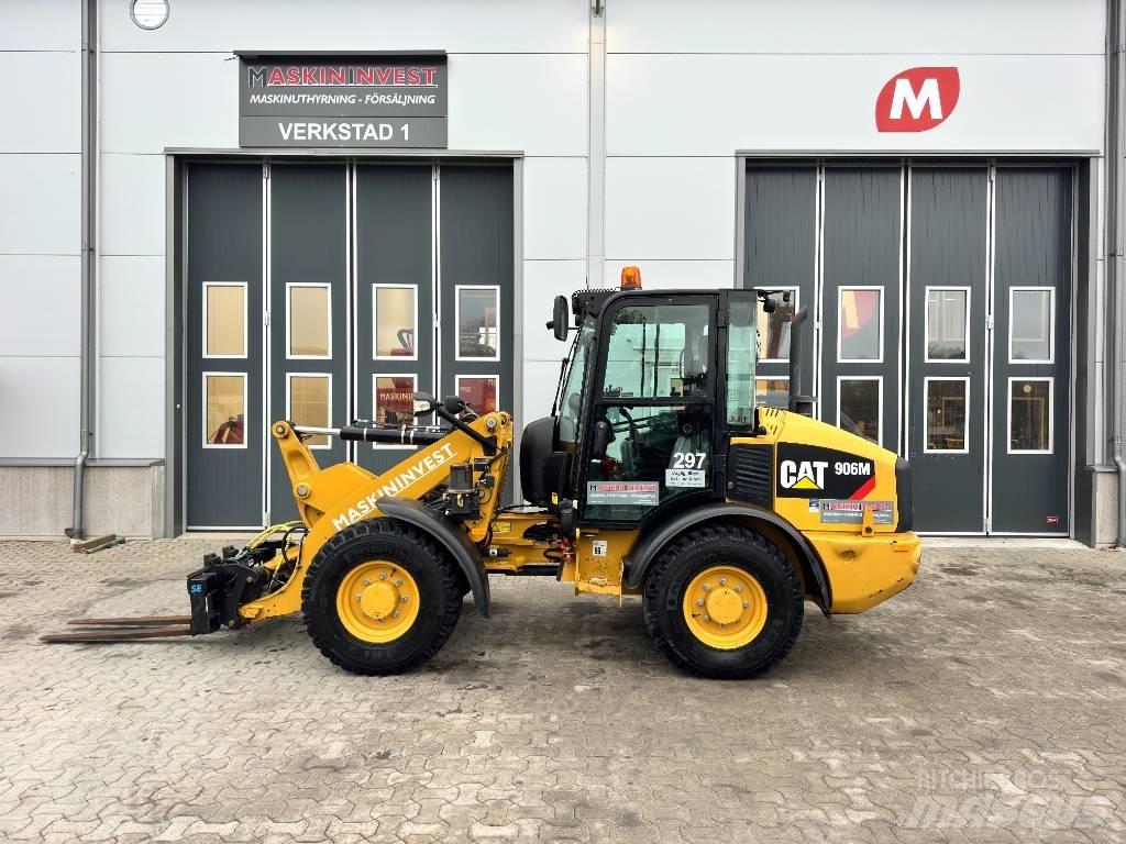 CAT 906M 35 km/h Kolové nakladače