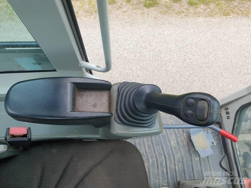 Takeuchi TB295W Kolová rýpadla